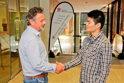 sps_1396_handshake Two men shaking hands